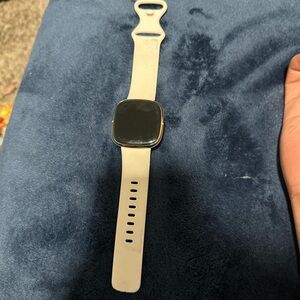 Fitbit Gold and White Smartwatch with Advanced Features